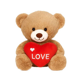 Teddy bear hugging a red love heart 20cm